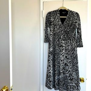 Navy-white faux-wrap maxi dress. Three quarter sleeves    Lined.  Polyester